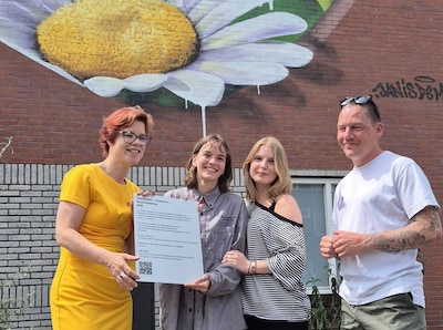 Officieel onthuld: de muurschildering van JanIsDeMan voor de kinderen van de toeslagenaffaire