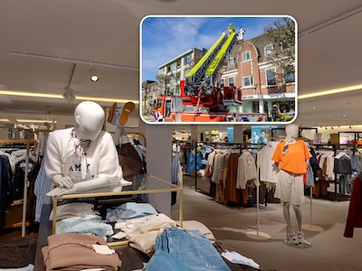 De kleding bij Anna van Toor is nog heel, maar onverkoopbaar na brand van gisteren: ‘Alles stinkt na