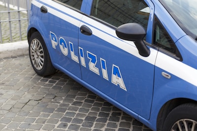 blue-police-car-with-inscription-police-in-italian