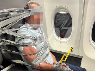 Passagier met ducttape vastgebonden in vliegtuig: ‘Hij had zijn handen om de nek van man naast hem’