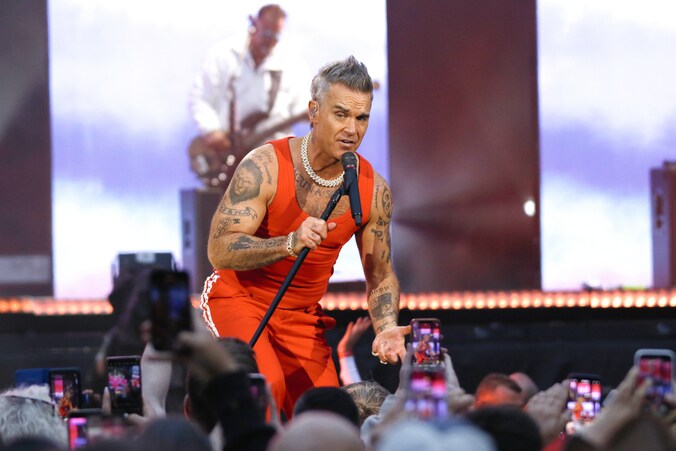 Robbie Williams doet in Arena wat Justin Timberlake naliet ...