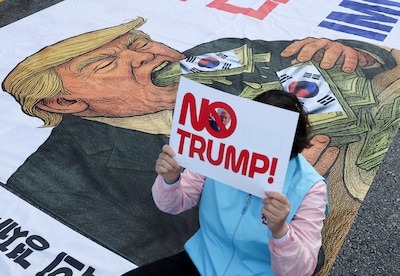Trump op reis door Azië: hint op ontmoeting met Kim Jong-un en praat met Xi over handelsoorlog
